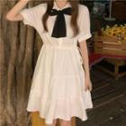 Short-sleeve Ribbon Tie-neck A-line Shirtdress