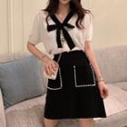 Bow Accent Short-sleeve Blouse / Rhinestone Mini A-line Skirt