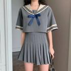 Short-sleeve Marine Collar Top + Pleated Mini Skirt