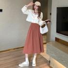 Long-sleeve Cropped Buttoned Blouse / Midi A-line Skirt
