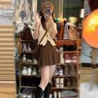 Short-sleeve Button-up Knit Top / Pleated Mini A-line Skirt