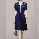 Set: Short-sleeve Collared Zip-up Top + A-line Skirt