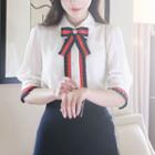 Pleated Contrast-trim Blouse With Bow Brooch