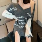 Asymmetric Frayed Letter Embroidered Top