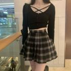 Long-sleeve Plain Cross-strap Top / Plaid Pleated Mini Skirt