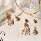 Non-matching Faux Pearl Fringed Earring