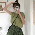 Lettering Sleeveless T-shirt / Asymmetric Plaid Skirt