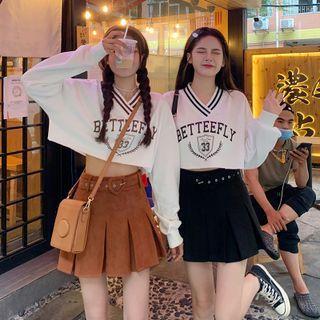 Long-sleeve Lettering Cropped Top + Belted Mini Skirt