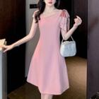 Cap-sleeve Asymmetrical Beaded A-line Dress