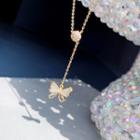Faux Crystal & Shell Butterfly Pendant Necklace Gold & White - One Size