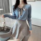 Set: Long-sleeve Tie-neck Knit Top + Mini A-line Skirt