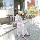 Tassel-neck Buttoned Pattern Maxi Dress