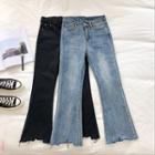 Asymmetric High-waist Frayed Jeans