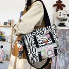 Cow Print Buckled Tote Bag