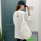 Pocket-front Smiley-patched T-shirt