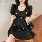 Short-sleeve Butterfly Detail A-line Dress