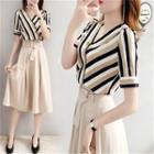 Set: Short-sleeve V-neck Striped Blouse + A-line Midi Skirt