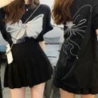Short Sleeve Bow Print T-shirt / Pleated Mini A-line Skirt