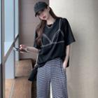 Loose-fit Printed T-shirt / Slited Houndstooth Wide Pants