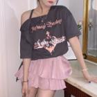Short-sleeve Cold-shoulder Lettering T-shirt / Ruffle Mini A-line Skirt