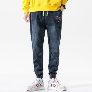 Lettering Embroidered Tapered Jeans