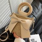 Bow Accent Straw Bucket Bag