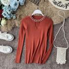 Faux-pearl Keyhole Long-sleeve Knit Top
