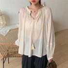 Tassel-trim Balloon-sleeve Shirred Blouse