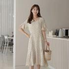 Tie-waist Ruffle-hem Dotted Dress Cream - One Size
