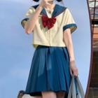 Set: Short-sleeve Sailor Collar Shirt + Pleated A-line Skirt + Bow Tie