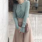 Long-sleeve Buttoned Top + A-line Midi Skirt