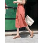 Band-waist Buttoned Wrap Skirt