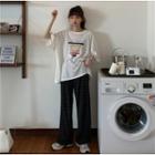 Elbow-sleeve Lettering T-shirt / Striped Wide Leg Pants