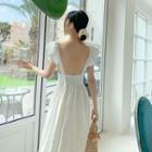 Sleeveless Open-back V-neck A-line Maxi Dress