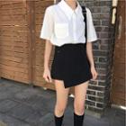 Plain Short-sleeve Blouse / Asymmetric Plain High-waist Skirt