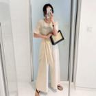 Wrap-front Wide-leg Linen Jumpsuit