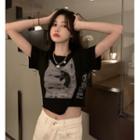 Short-sleeve Graphic Print Asymmetrical Hem Cropped T-shirt