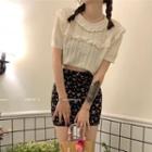 Short-sleeve Ruffle Trim Cropped Knit Top + High-waist Floral Printed Mini Skirt