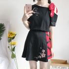 Embroidered Cut Out Shoulder Short Sleeve T-shirt / Pleated Skirt