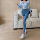 Snap-button Knit Top / High-waist Skinny Jeans