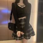Long-sleeve Strappy Crop Top / Plaid Pleated Mini A-line Skirt