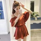 Set: Ruffle Trim Cut Out Shoulder Elbow Sleeve Top + Plain Skort