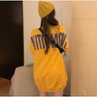 Ribbon-accent Loose-fit Printed Pullover Yellow - One Size