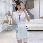 Set: Short-sleeve Tasseled Embroidered Cheongsam Top + A-line Skirt