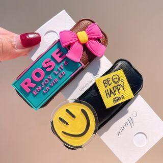 Bow / Smiley Faux Leather Hair Clip