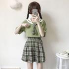 Collared Short-sleeve Top With Plaid Neck Tie / Plaid A-line Skirt