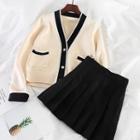 Long-sleeve Knit Cardigan + Pleated Skirt
