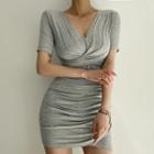 Short-sleeve V-neck Twist-front Ruched Mini Sheath Dress