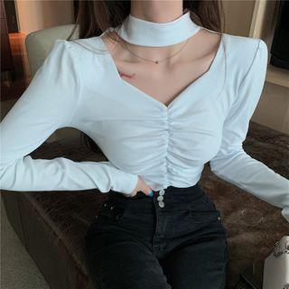 Long-sleeve Ruched Cutout Mock-neck Top