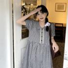 Puff-sleeve Gingham Midi A-line Dress Plaid - Black & White - One Size